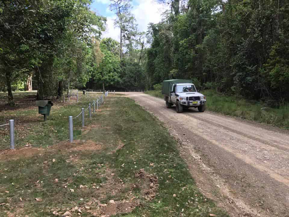 Rural fencing along a property access road
