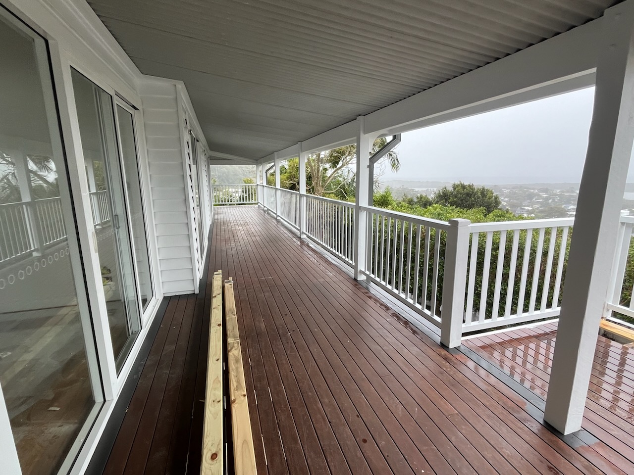 White balustrade on a timber verandah